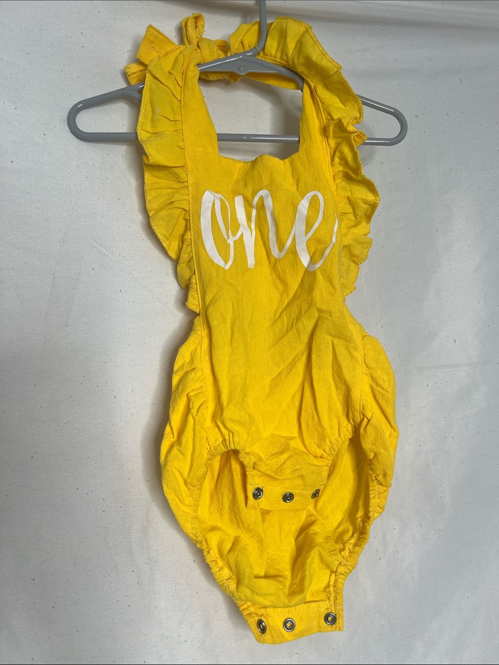Yellow "One" Ruffle-Shoulder Baby One-Piece